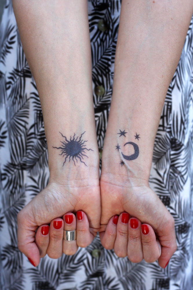 SOL NEGRO CON LUNA Y ESTRELLAS