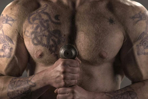 tattoos on a man’s chest