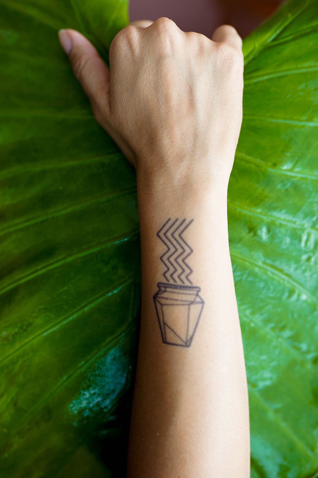 Aquarius Zodiac Sign Temporary Tattoo, showcasing a beautiful geometric style