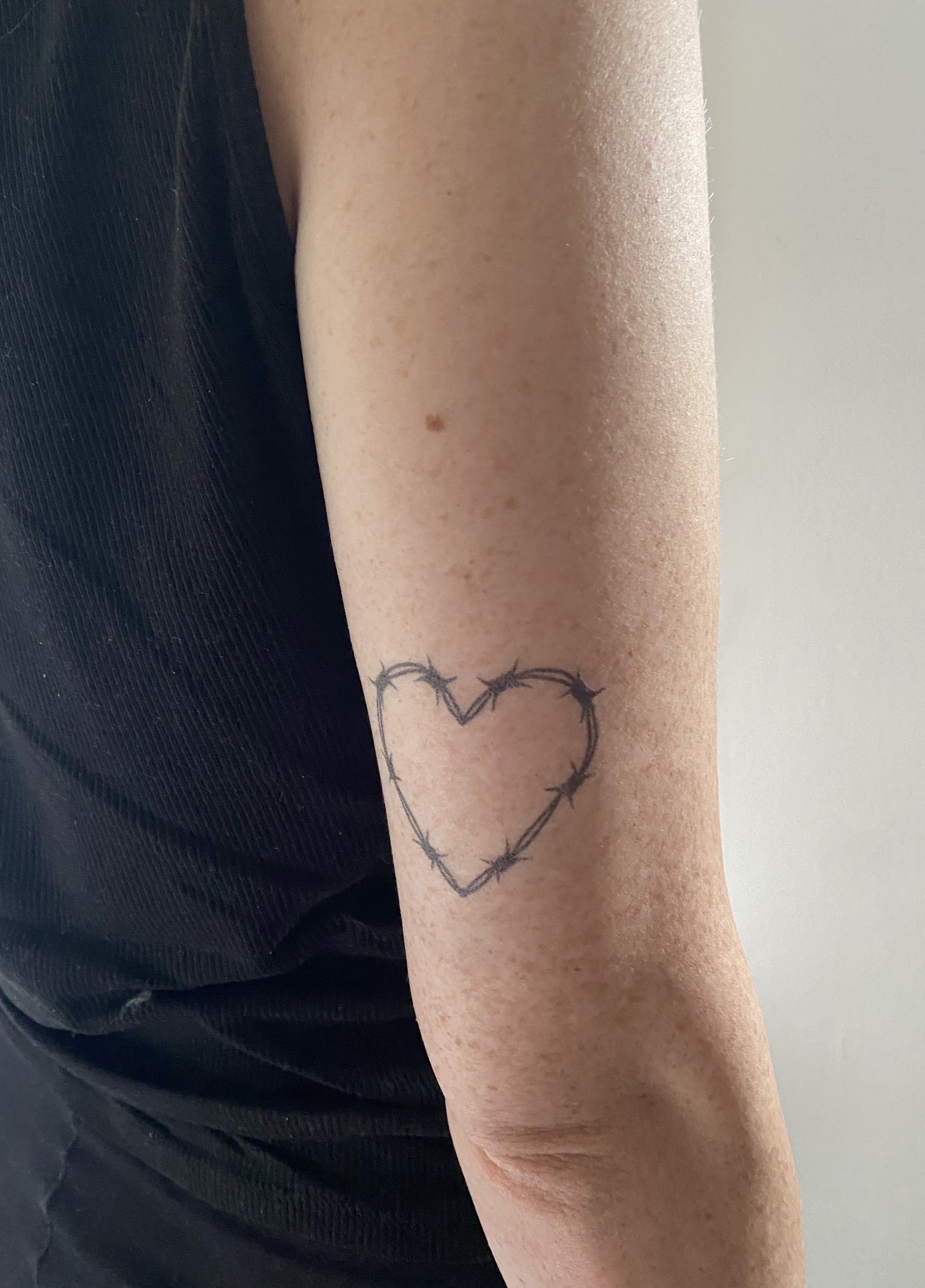 Heart Tattoos with Barb Wire: Raw Beauty