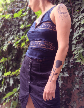 black rose tattoo on girls arm